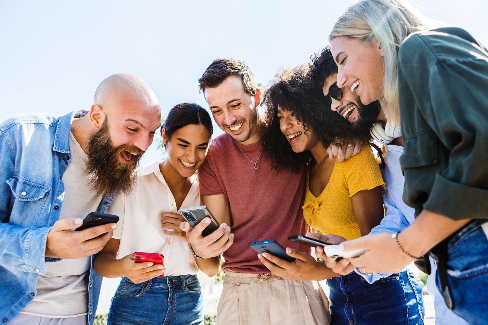 Silhouettes of people chatting with a glowing AI icon in the middle, symbolizing AI joining the group chat