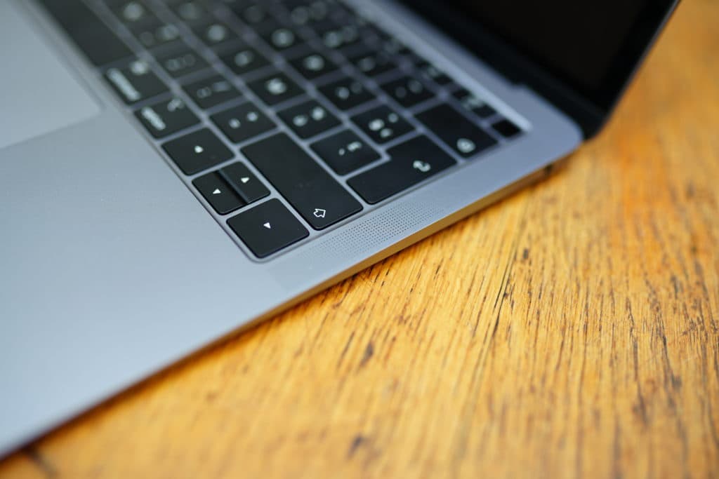 Close-up photo of a MacBook keyboard, symbolizing desktop app distribution for indie developers