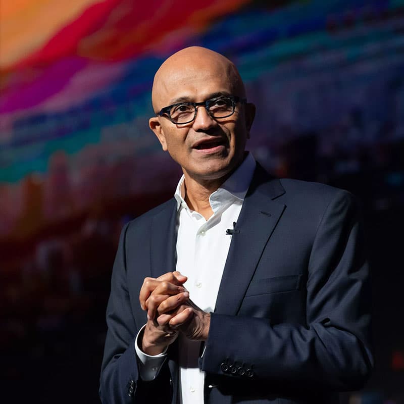 Microsoft CEO Satya Nadella speaking on stage; he published the 'Models as Insider Risks' essay on X on October 10, 2026