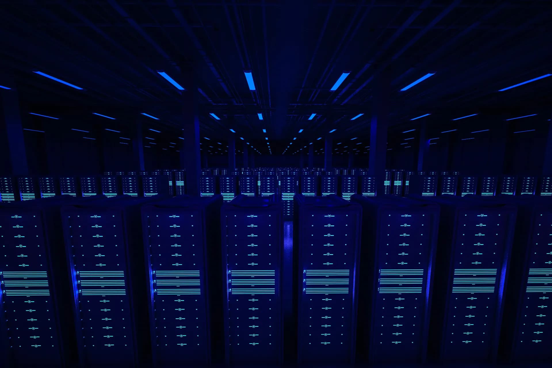 Dark data center server hall illustrating disaster recovery infrastructure