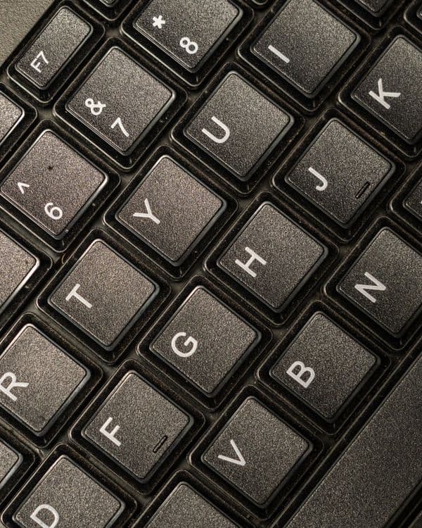 A real close-up photograph of computer keyboard keys, not a screenshot of any product's shortcut settings