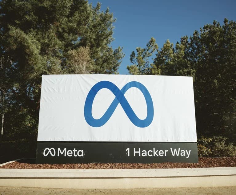 Photo of the Meta sign at 1 Hacker Way, Menlo Park headquarters