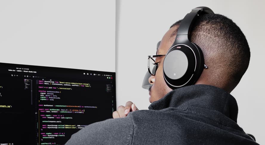 Real photo of developers working at computers, representing the everyday work of Codex subscription users