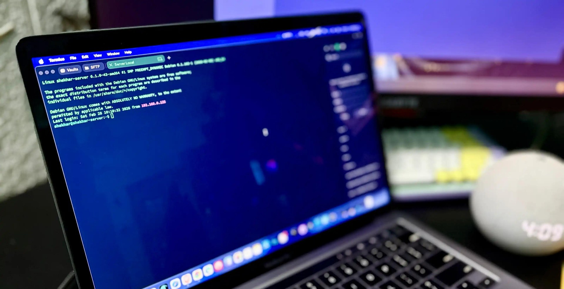 Real photo: managing a local Linux server via Termius on a laptop