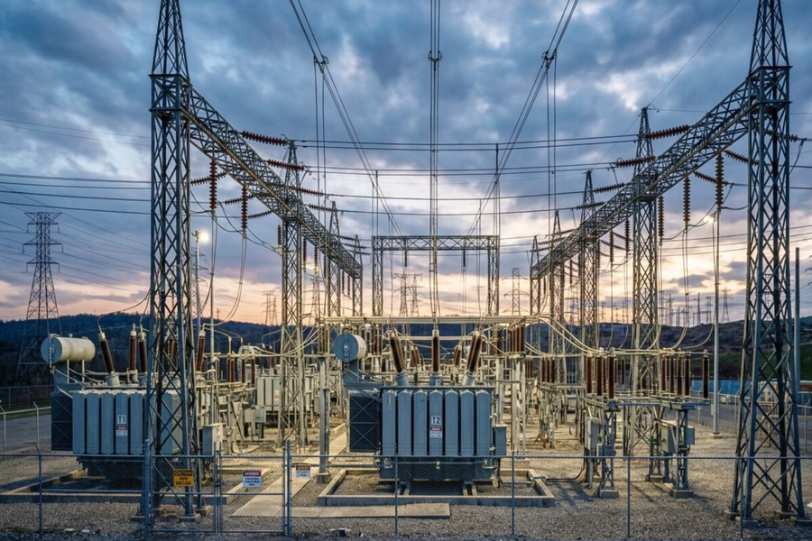 High-voltage power substation at dusk: critical power infrastructure