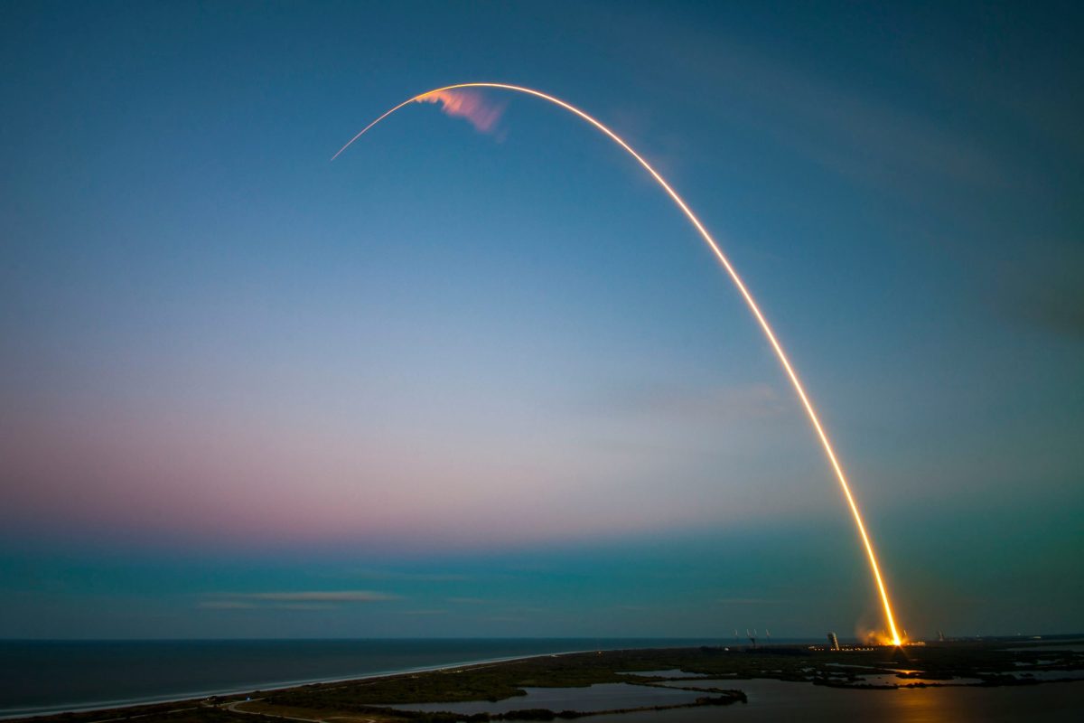 A rocket lifting off at dawn, symbolizing a product launch day