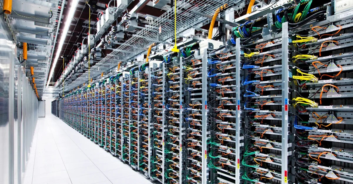 Real photo of data center server racks: agent-training sandbox platforms like DeepSeek DSec are turning data centers into training grounds for AI agents