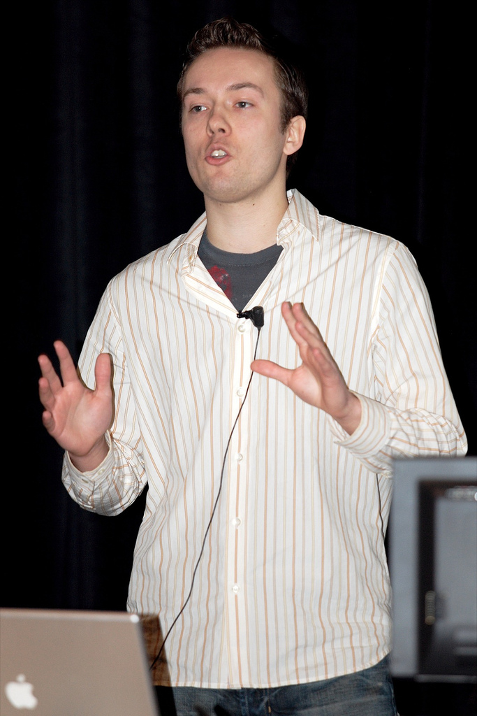 Illustration of DHH's AI rewrite experiment: the Rails original Campfire Once rewritten by AI into Rust, Elixir, and Go versions, with nobody reading the code